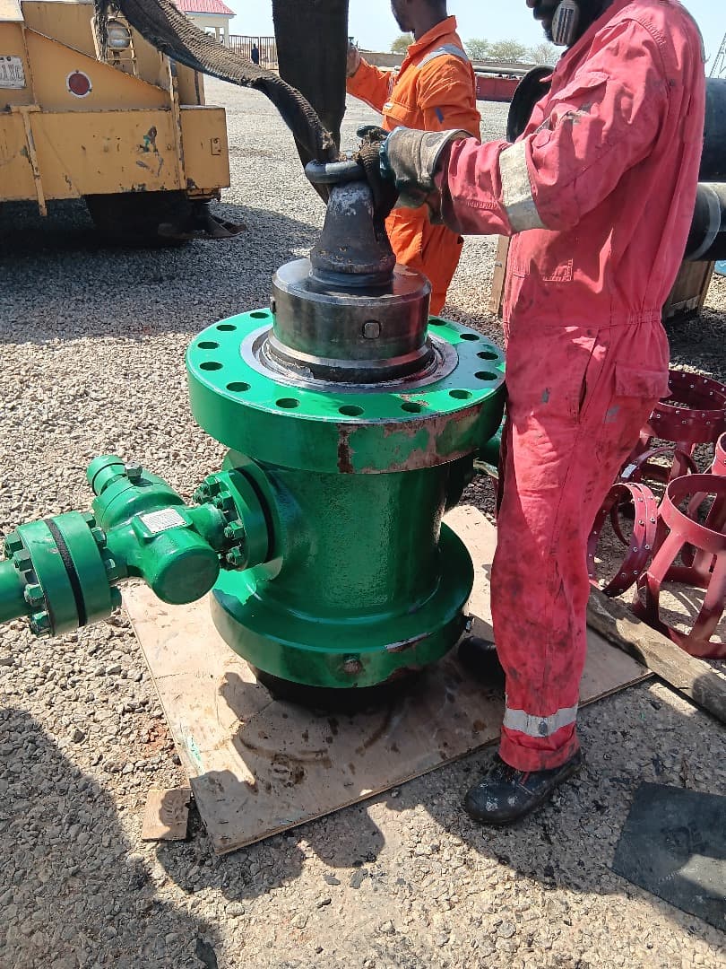 GGSL drilling crew working around rig readiness equipment