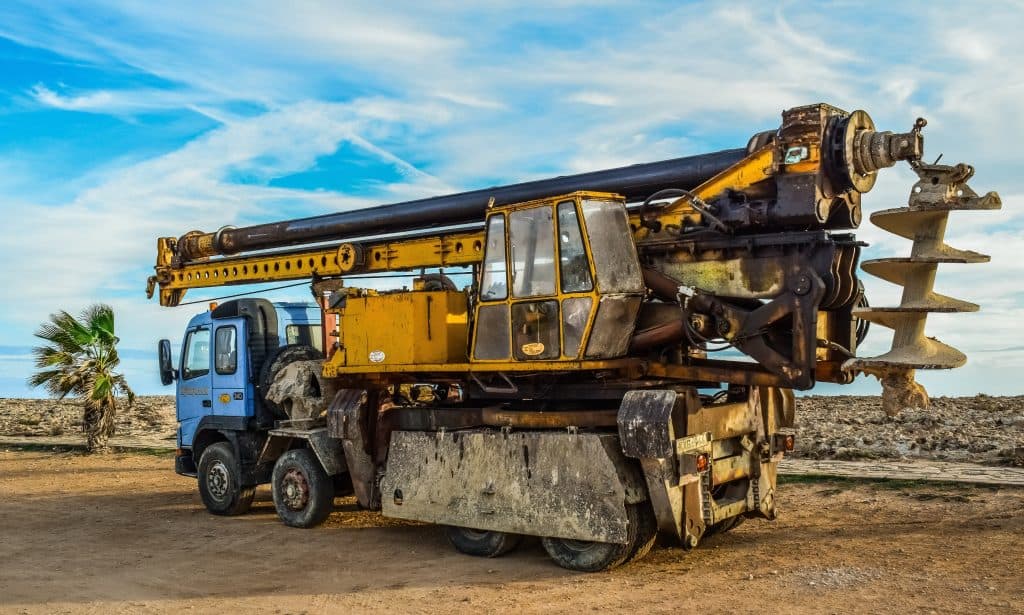 GGSL field auger truck operating on an oil and gas service location